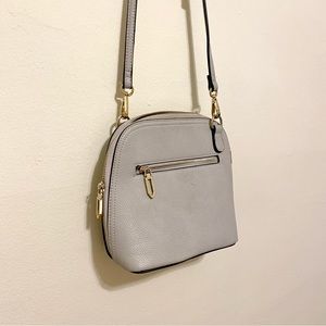 Light grey crossbody leather purse gold toned hardware